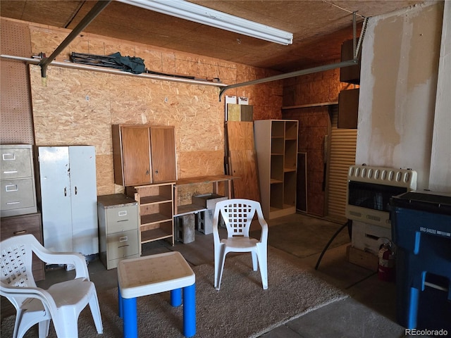 5621 Demott Ave, Commerce City, CO 80022 - miscellaneous room with heating unit