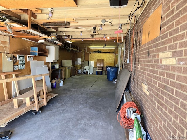 5621 Demott Ave, Commerce City, CO 80022 - interior space featuring white refrigerator and a garage door opener