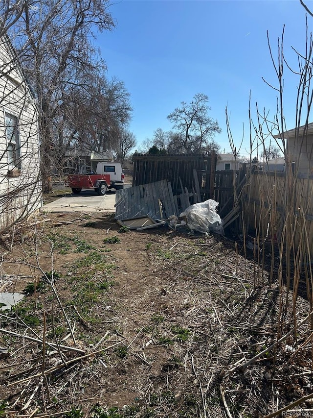 view of yard with fence