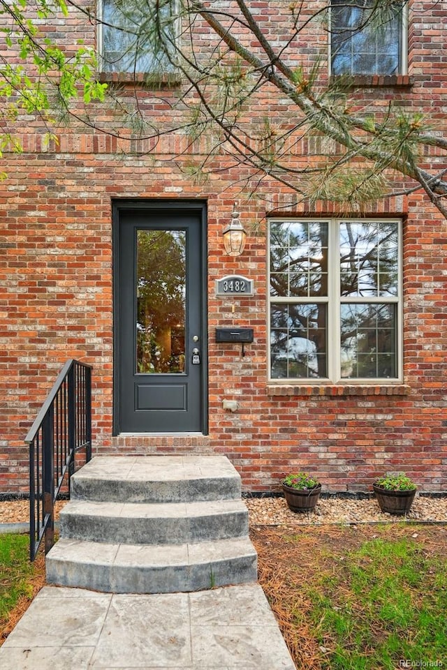 3482 E 28th Ave, Denver, CO 80205 - entrance to property with brick siding