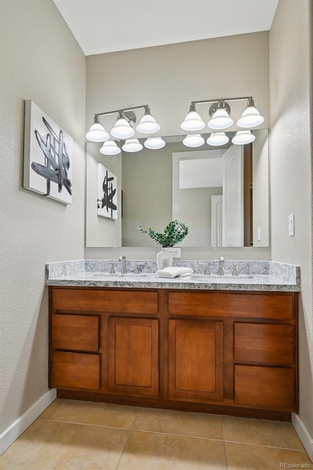 3482 E 28th Ave, Denver, CO 80205 - full bath featuring double vanity, tile patterned floors, and baseboards