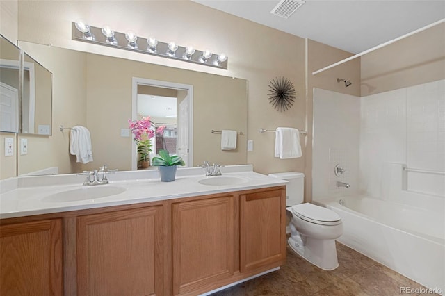 full bathroom featuring vanity, tile patterned floors, tub / shower combination, and toilet