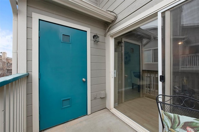 doorway to property featuring a balcony