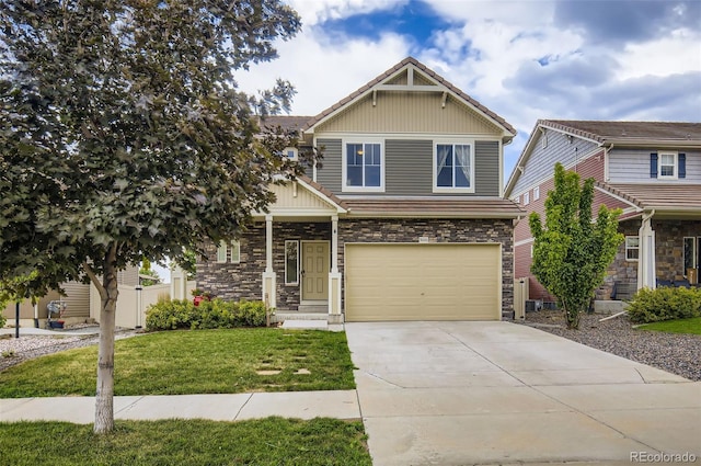 5010 Eaglewood Ln, Johnstown, CO 80534 - craftsman house with stone siding, concrete driveway, and an attached garage