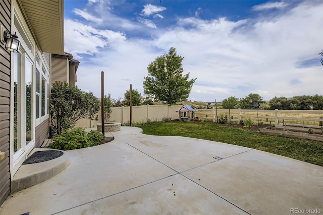 5010 Eaglewood Ln, Johnstown, CO 80534 - fenced backyard featuring a patio area