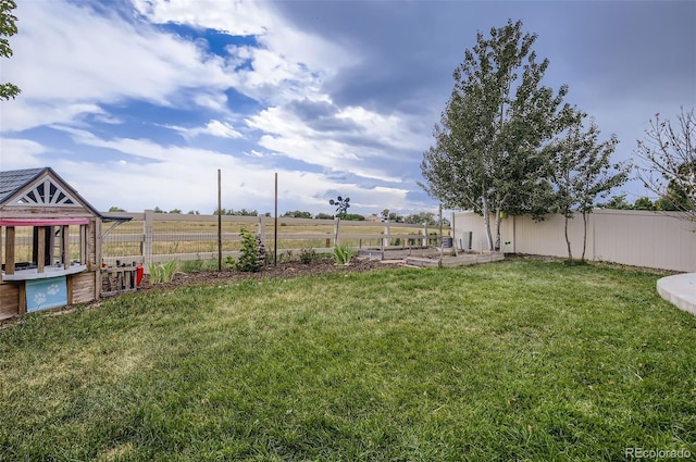 5010 Eaglewood Ln, Johnstown, CO 80534 - fenced yard featuring a garden
