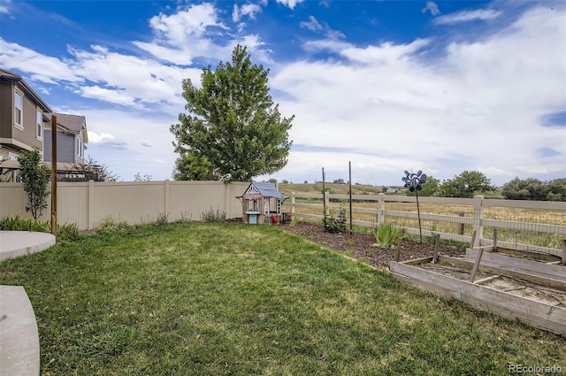5010 Eaglewood Ln, Johnstown, CO 80534 - view of yard featuring a garden