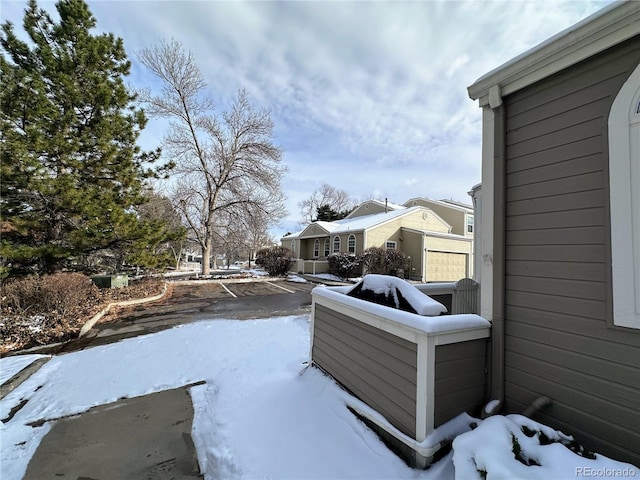 view of yard covered in snow