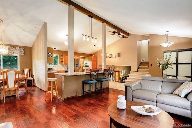 8866 E Easter Ave, Centennial, CO 80112 - living room with dark wood-style floors, stairs, and a chandelier
