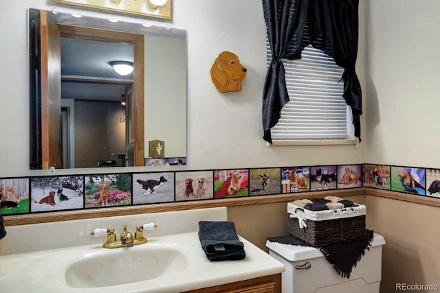 8866 E Easter Ave, Centennial, CO 80112 - bathroom featuring vanity and toilet
