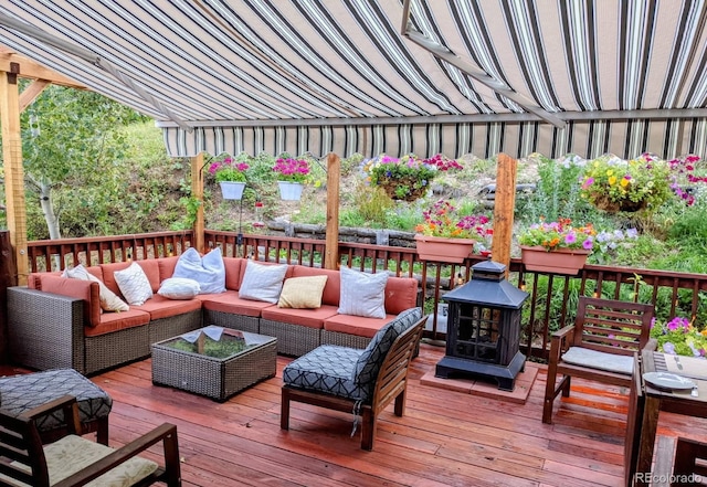 32209 Blue Springs Dr, Evergreen, CO 80439 - wooden terrace with outdoor lounge area