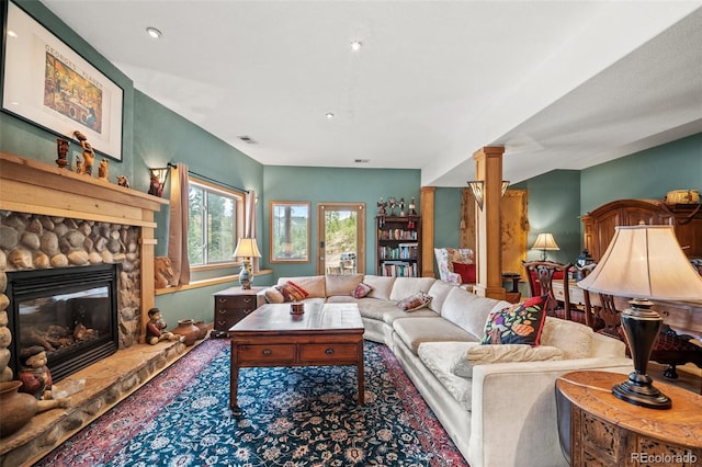 32209 Blue Springs Dr, Evergreen, CO 80439 - living area with decorative columns and a fireplace