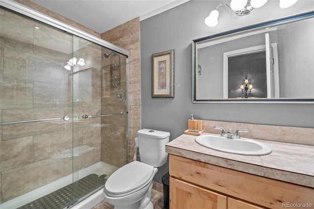 32209 Blue Springs Dr, Evergreen, CO 80439 - bathroom with toilet, vanity, and a shower stall