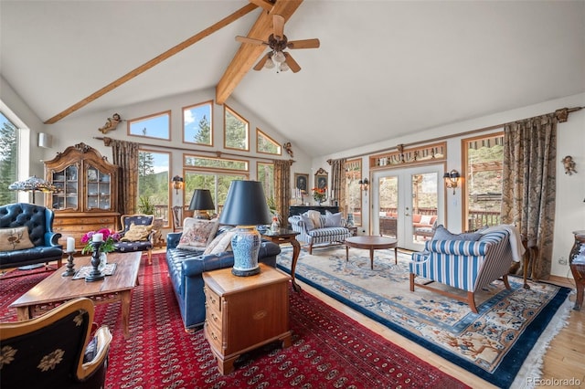 32209 Blue Springs Dr, Evergreen, CO 80439 - living area with french doors, beam ceiling, wood finished floors, high vaulted ceiling, and a ceiling fan