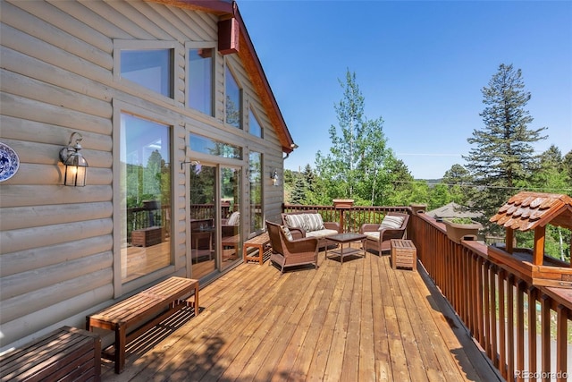 32209 Blue Springs Dr, Evergreen, CO 80439 - wooden terrace with outdoor lounge area