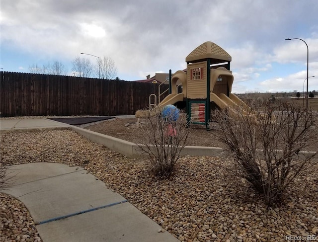 view of play area featuring fence