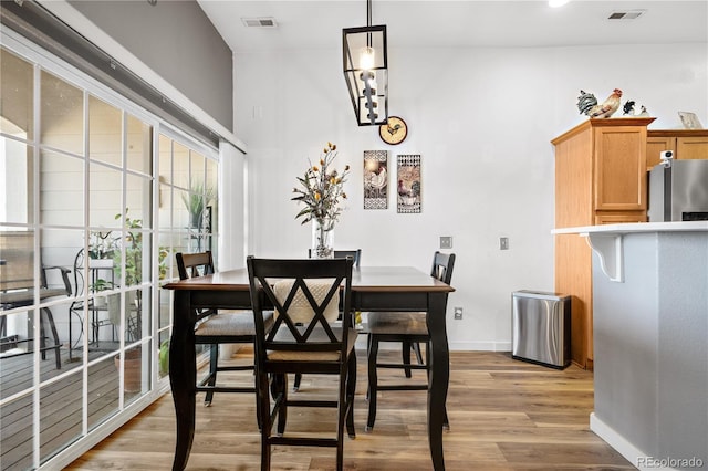 8944 Fox Dr Unit 6-103, Denver, CO 80260 - dining space featuring light wood-type flooring and baseboards