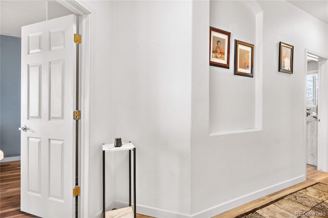8944 Fox Dr Unit 6-103, Denver, CO 80260 - hallway with wood finished floors and baseboards
