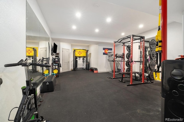 workout area featuring recessed lighting