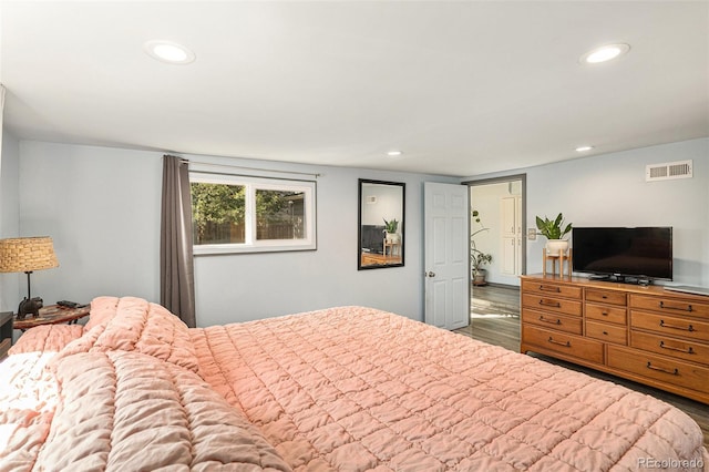 3768 S Acoma St, Englewood, CO 80110 - bedroom featuring recessed lighting, visible vents, and wood finished floors