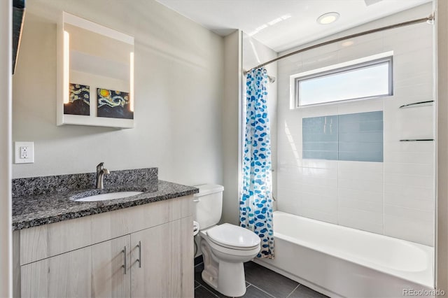 full bathroom featuring shower / tub combo with curtain, vanity, toilet, and tile patterned floors