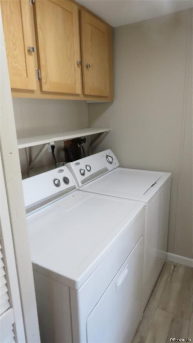 150 Palmer Ave, Poncha Springs, CO 81242 - laundry area with washing machine and clothes dryer and cabinet space