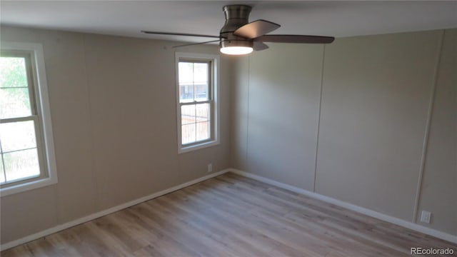 150 Palmer Ave, Poncha Springs, CO 81242 - empty room featuring wood finished floors, a ceiling fan, and plenty of natural light