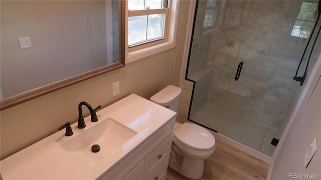 150 Palmer Ave, Poncha Springs, CO 81242 - bathroom with a shower stall, vanity, and wood finished floors