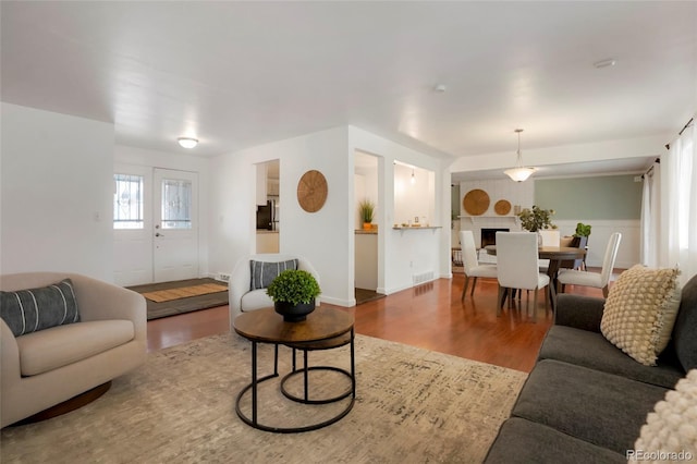 living room with hardwood / wood-style flooring and french doors