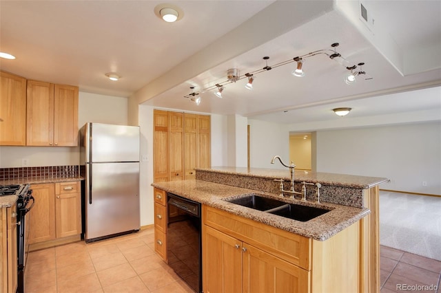kitchen featuring black appliances, a sink, light tile patterned flooring, and light stone counters