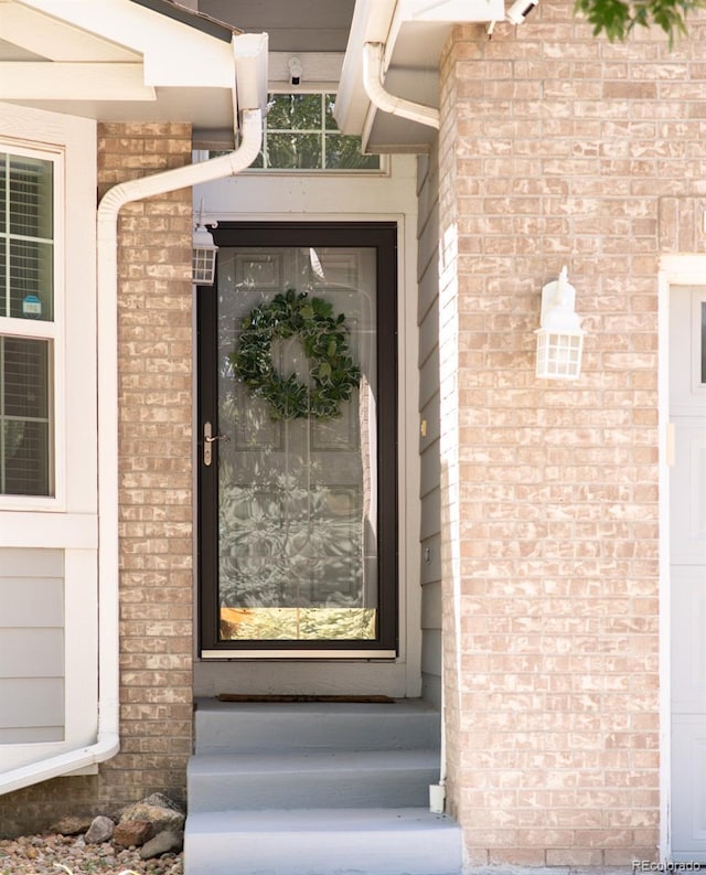 5282 E 116th Ave, Thornton, CO 80233 - doorway to property with brick siding
