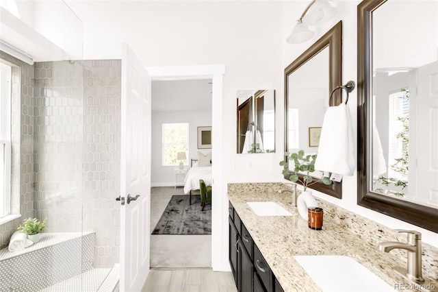5282 E 116th Ave, Thornton, CO 80233 - full bath with connected bathroom, double vanity, and tiled shower
