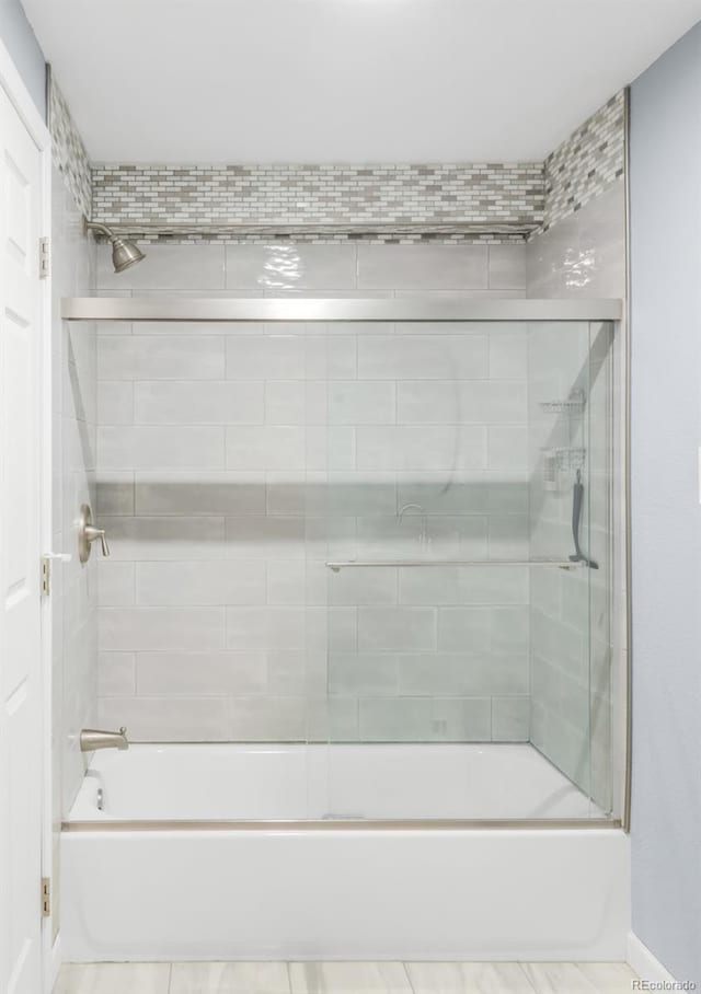 5282 E 116th Ave, Thornton, CO 80233 - bathroom with  shower combination and tile patterned floors