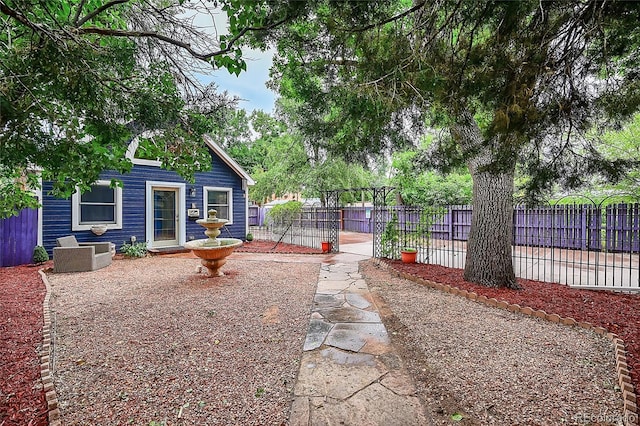 view of yard featuring a patio and fence