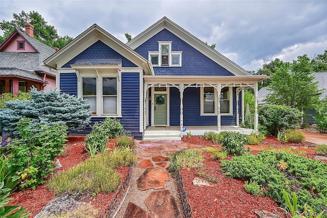 victorian home featuring covered porch