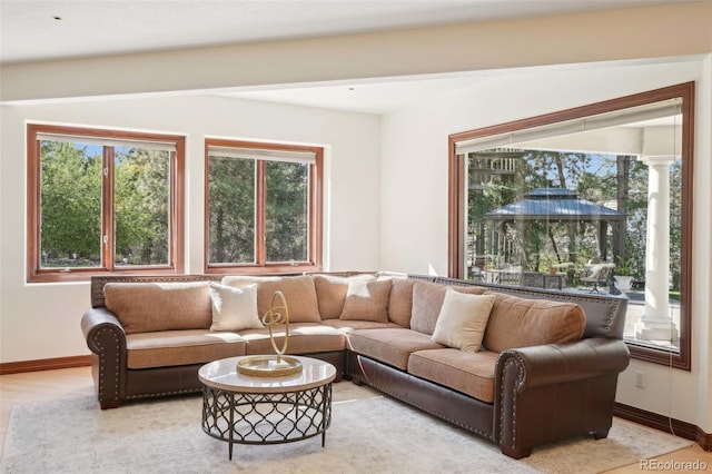 living room featuring baseboards