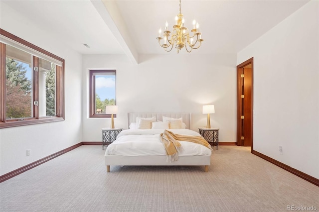 carpeted bedroom featuring baseboards, a notable chandelier, and visible vents