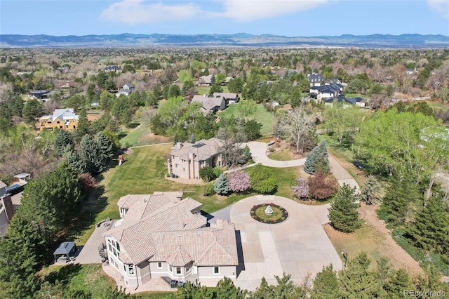 birds eye view of property featuring a mountain view