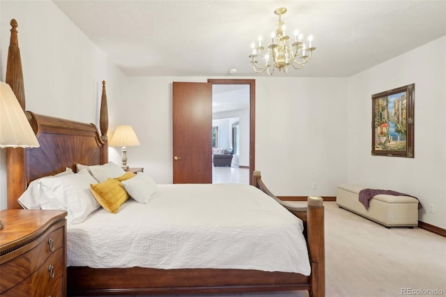 bedroom featuring baseboards, light colored carpet, and a chandelier
