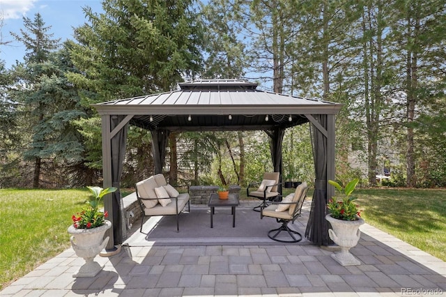 view of patio featuring a gazebo and an outdoor living space