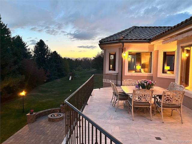 view of patio / terrace featuring a fire pit and outdoor dining space