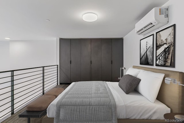 bedroom featuring a wall mounted air conditioner and visible vents