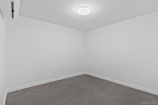 empty room with baseboards