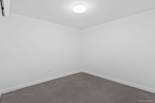 empty room with baseboards