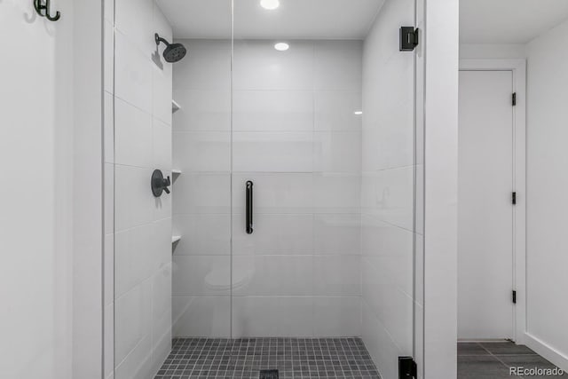 bathroom with a shower stall