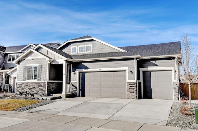 craftsman house with a garage