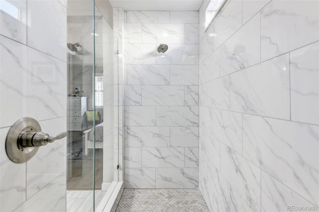 bathroom with an enclosed shower