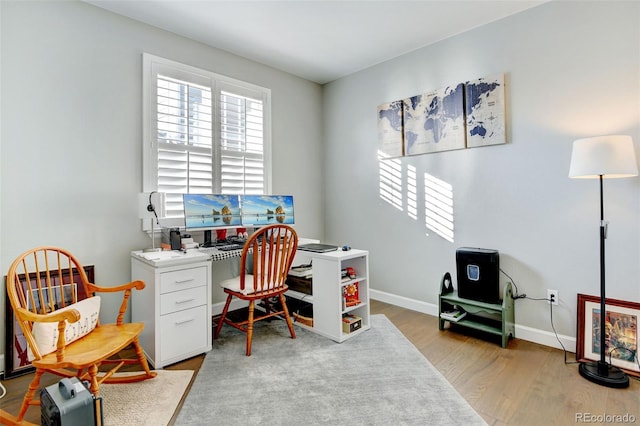 home office featuring light wood-type flooring