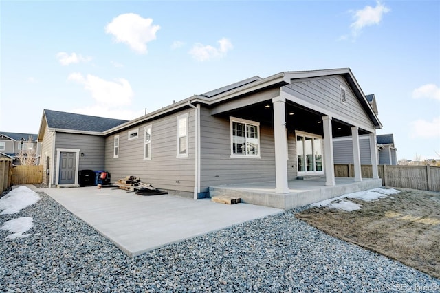 back of property with a patio area