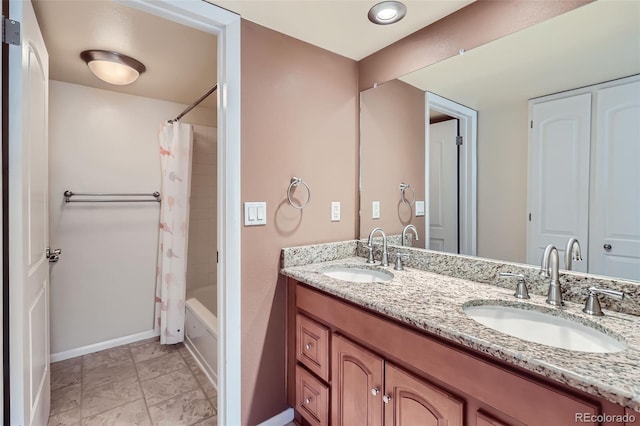 bathroom featuring baseboards, double vanity, and shower / bathtub combination with curtain